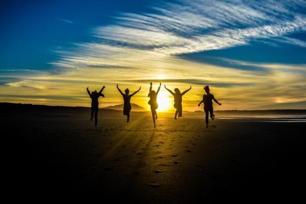 running jumping in sunset