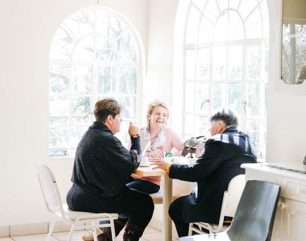 friends sitting around table